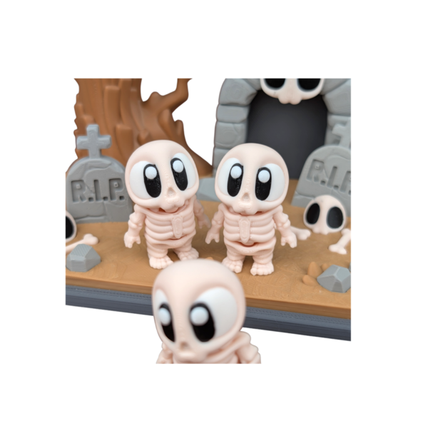 3D printed mini skeleton graveyard decor with miniature gravestone display