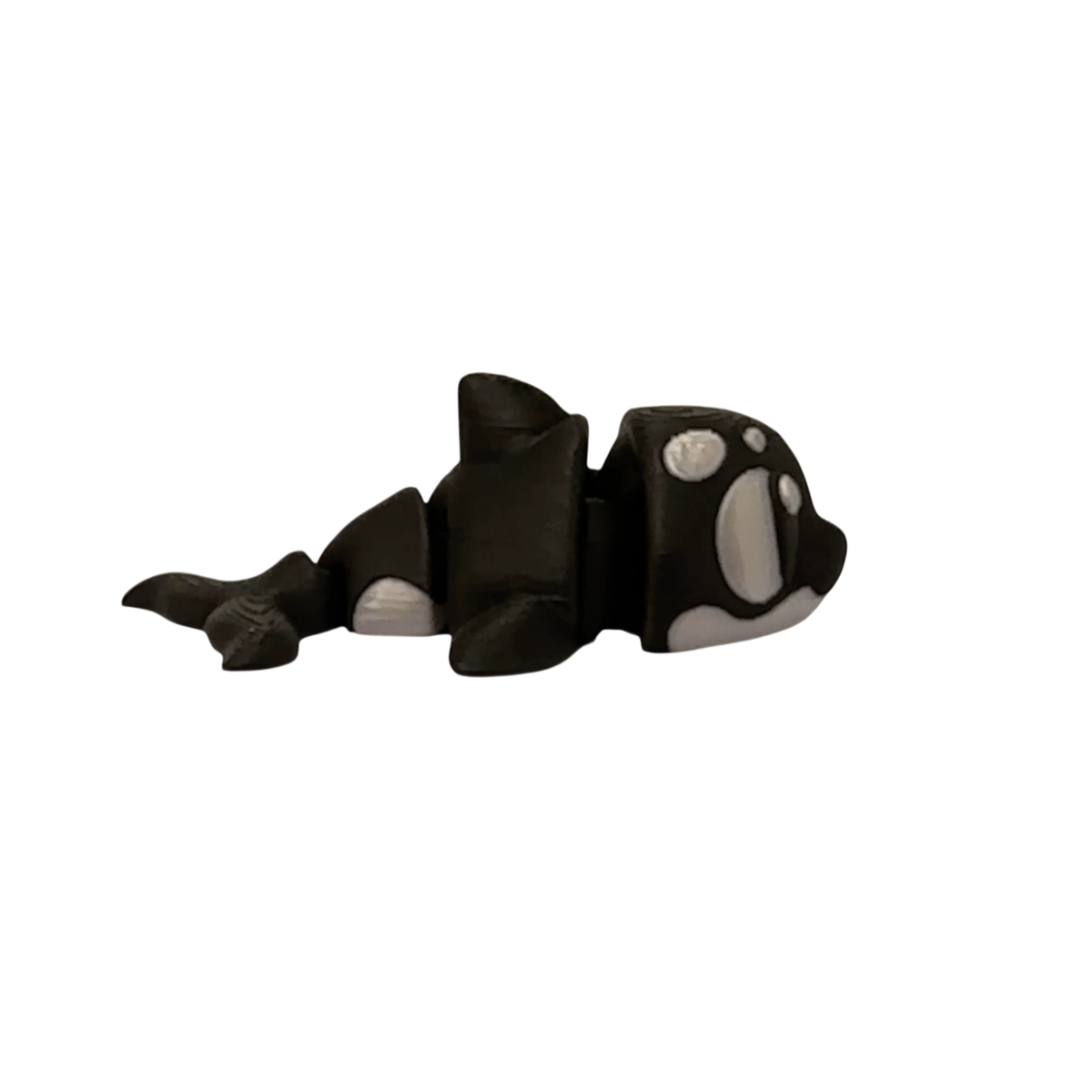 03-camo-screenshot-2025-10-25-13-34-19-no-bg Articulated 3D Printed Orca Figurine view 3